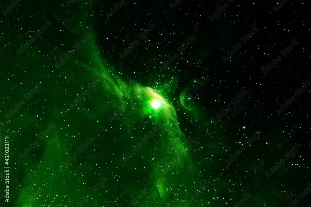A beautiful, bright green nebula. Elements of this image were furnished by  NASA. Stock Photo | Adobe Stock