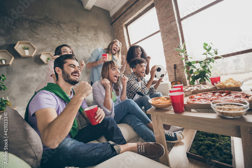 Canvas Print Full body photo of cheerful happy people men and women look watch tv watch game
