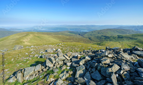 The mountain summit of Creagan na Corr on the left with Loch Rannoch and Rannoch Forest in centre from the top of Carn Gorm in the Scottish Highlands, UK landscapes. photo