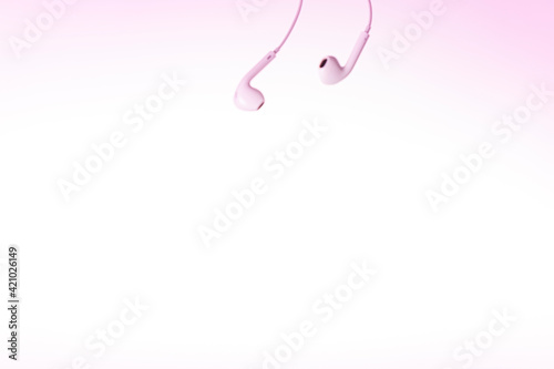 Earphones on white and pink background