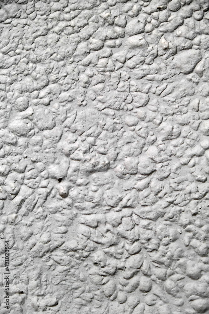textured stucco background with scratches. uneven plaster backdrop