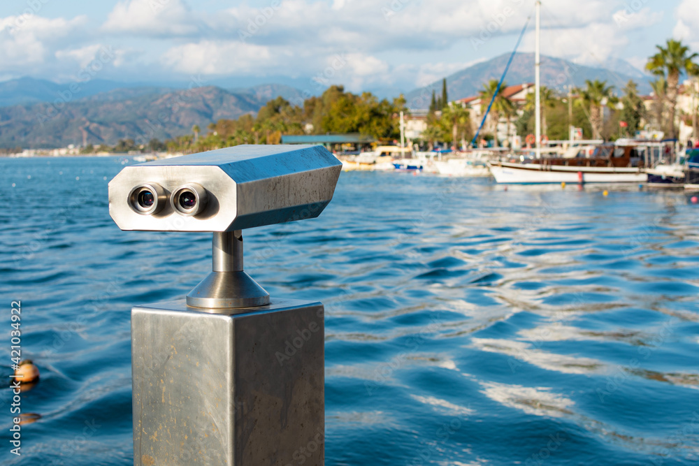 The promenade of the city of Fethiye, boats are at bay in the blue waters of the Mediterranean. The resort town of Turkey. The promenade of the city of Fethiye, boats are at bay in the blue waters of the Mediterranean. The resort town of Turkey.
