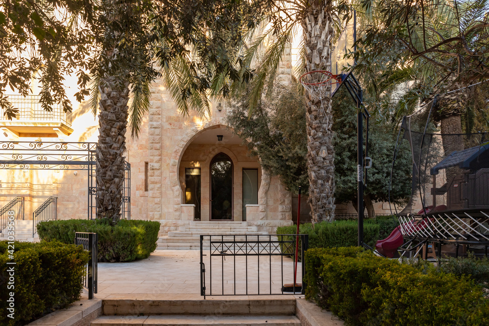 Fototapeta premium Evening view of a quiet residential Yehuda Alkalai Street in the old district of Jerusalem Talbia - Komiyut in Jerusalem, Israel