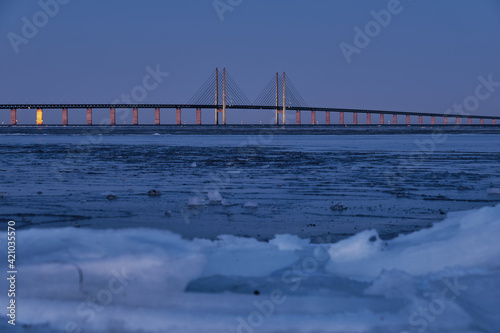 Oresund bridge winter, frozen sea.