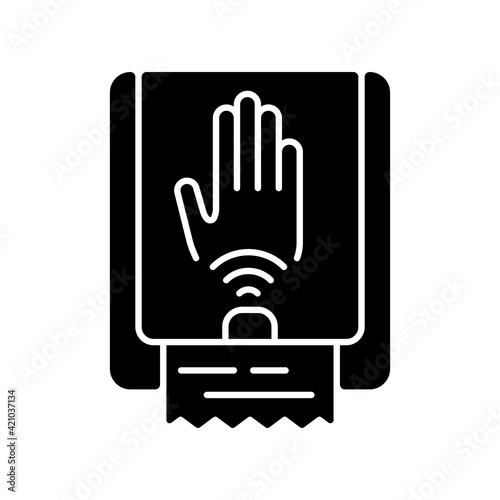 Touchless towel dispenser black glyph icon. Automatic device that has motion sensor which dispense towel when wet hands are placed below. Silhouette symbol on white space. Vector isolated illustration