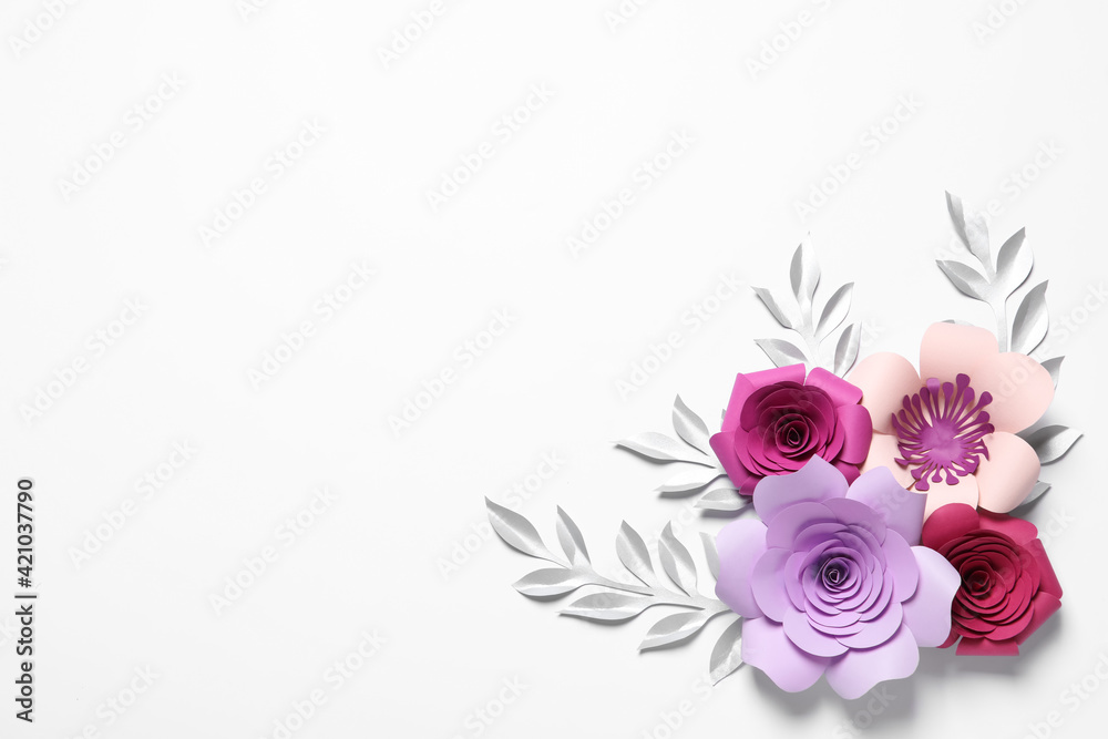 Different beautiful flowers and branches made of paper on white background, top view Different beautiful flowers and branches made of paper on white background, top view
