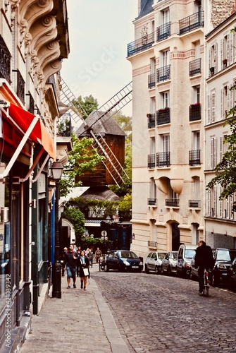 Montmartre, Paris, France: Windmill Le Moulin de la Galette (Blute-fin) A restaurant for those seeking entertainment, a glass of wine and bread made from flour ground by the windmill.