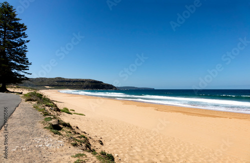Fototapeta Naklejka Na Ścianę i Meble -  Walkway along empty beach in Sidney Australia coast
