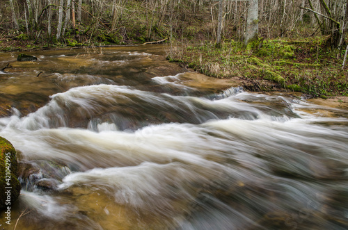 The rocky Valgale river with rapids  photographed with a long exposure.