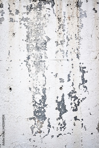White paint spots on concrete wall, background, texture. Old plaster.