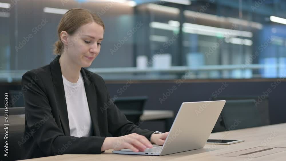 Businesswoman Feeling Angry While using Laptop Businesswoman Feeling Angry While using Laptop
