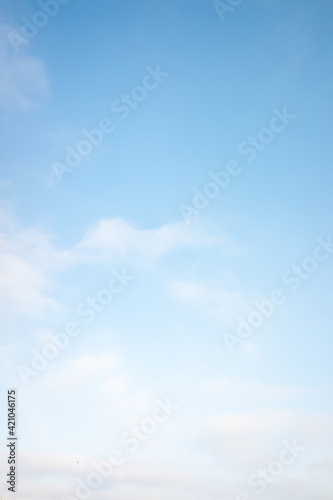 blue sky haze of white clouds, background.