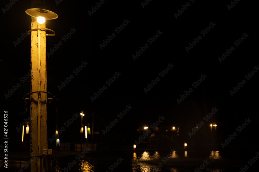 lamp with yellow lighting in evening