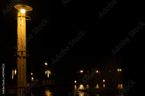 lamp with yellow lighting in evening