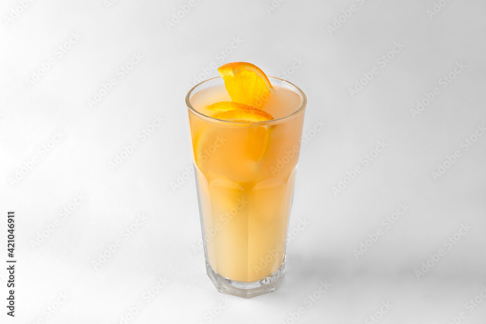 transparent glass of yellow refreshing summer drink transparent glass of yellow refreshing summer drink