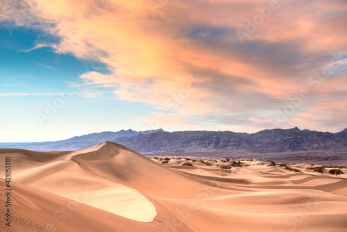 Beautiful sand dunes landscape seen at Death Valley National Park  California at sunset