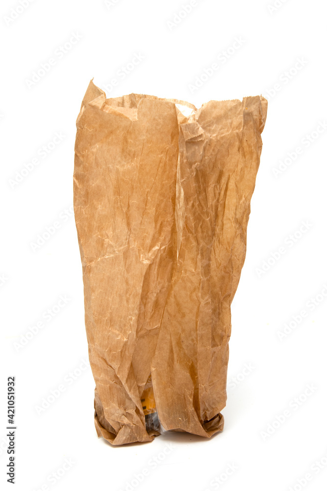 crumpled greasy paper bag on white background crumpled greasy paper bag on white background
