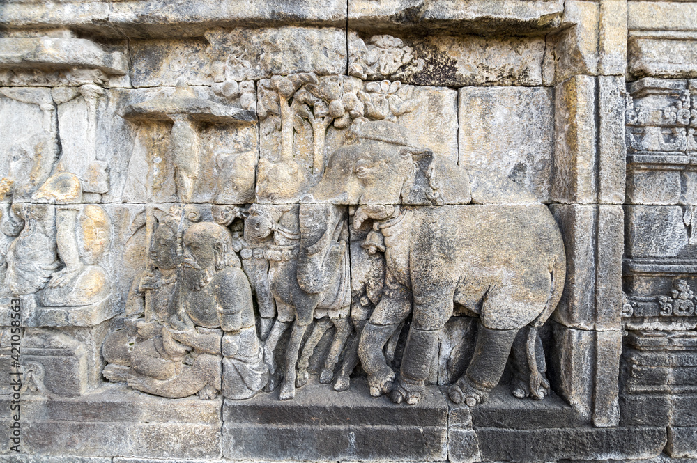 Bas-relief statue at Borobudur, a 9th-century Mahayana Buddhist temple in Central Java