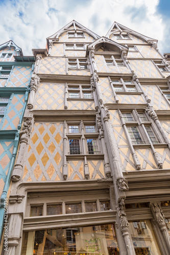 Angers, France. Facade of the half-timbered Maison d'Adam with wooden sculptures, 15th century 