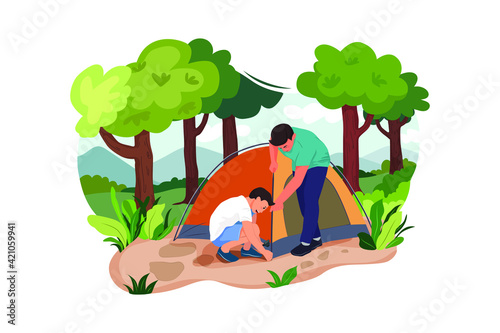 Father and Son putting up a tent