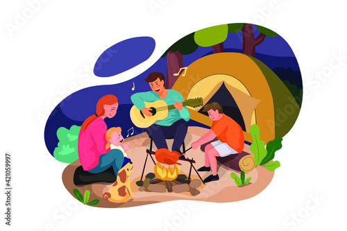 Happy family enjoying camping in the forest