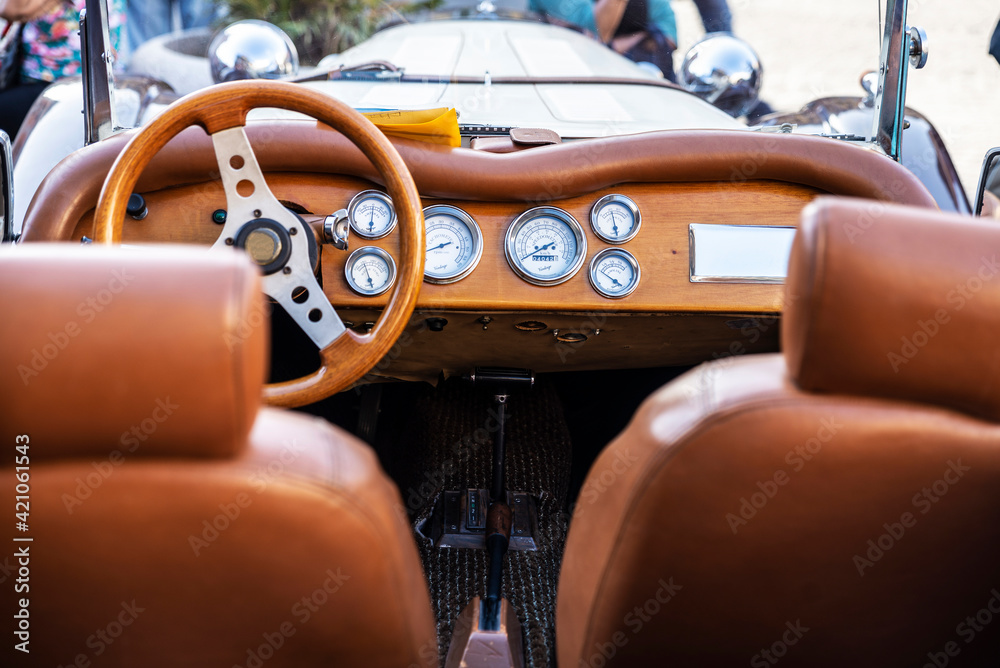 Wooden steering wheel of an old retro car of 1920