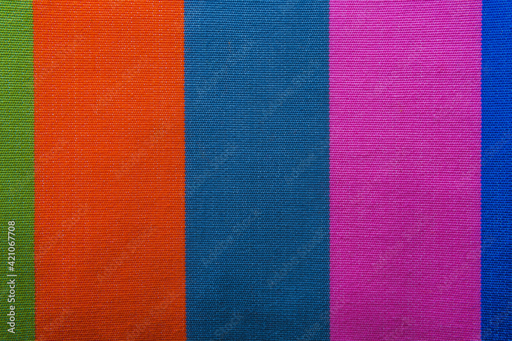 Piece of parallel colorful fabric. Texture. Piece of parallel colorful fabric. Texture.