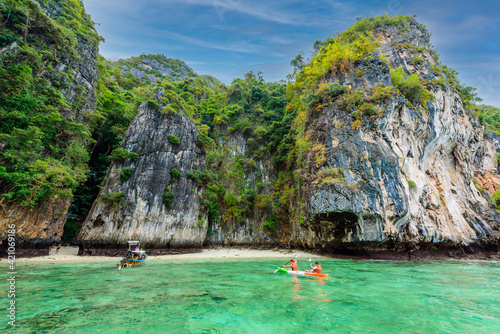 The small Monkey beach in paradise Bay - about 5 minutes boat ride from the Ao Ton Sai Pier - Koh Phi Phi Don Island at Krabi, Thailand - Tropical travel destination
