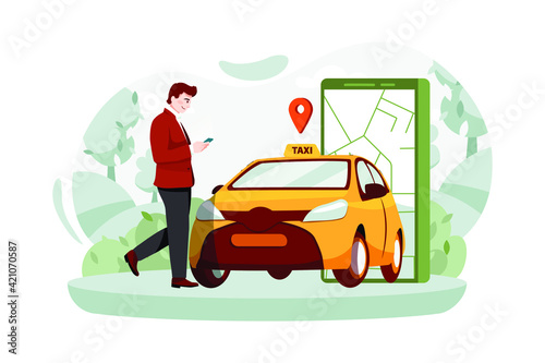A man with a smartphone standing near the car. 