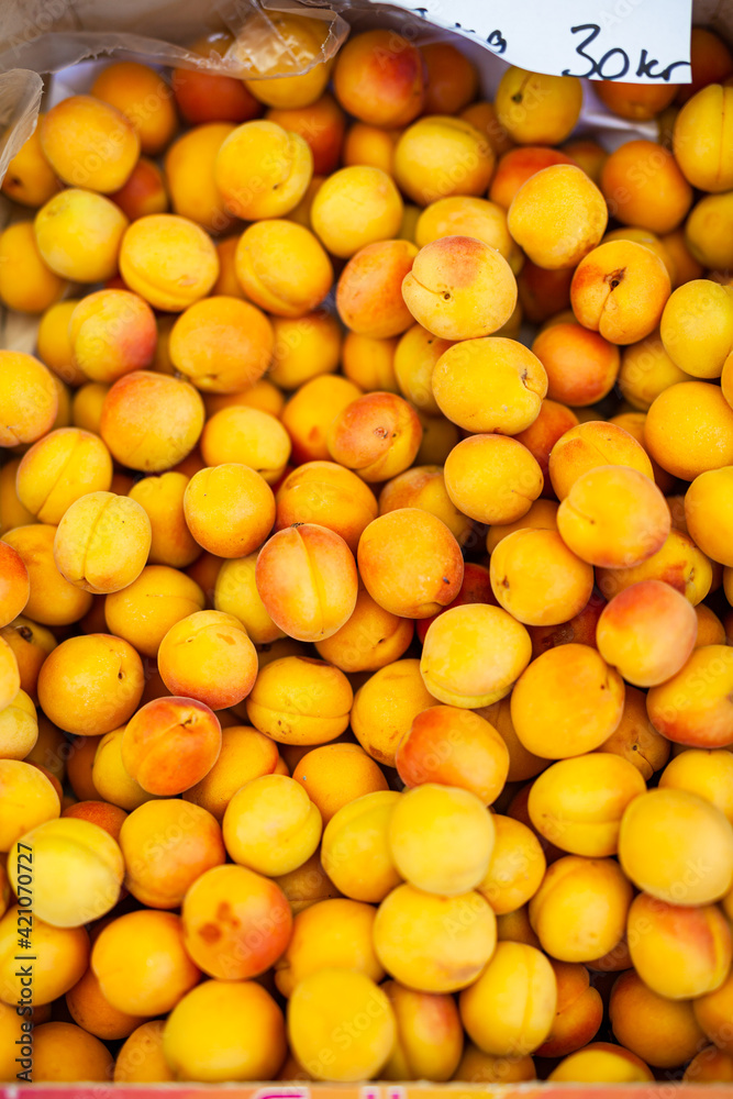 fresh ripe peaches in a box