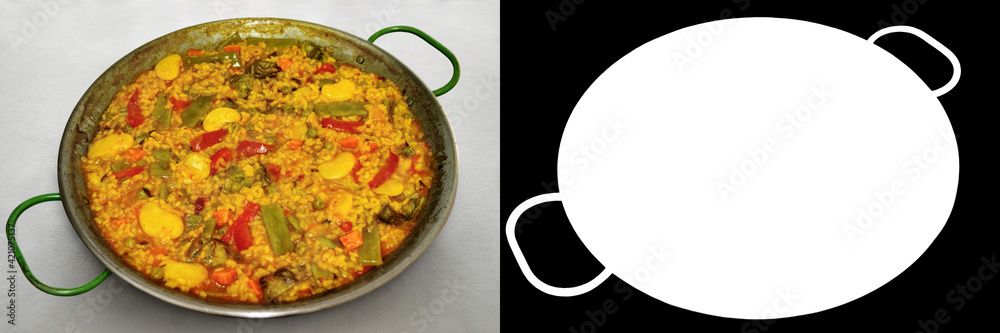 Vegetable paella. Typical valencian dish, vegan version. Image with clipping path