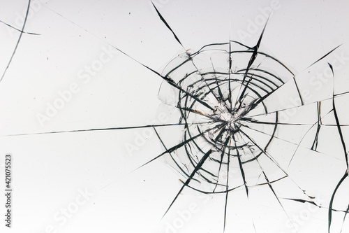 Cracks on the glass on a white background.
