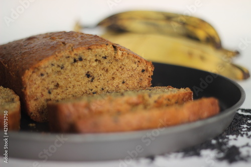 Slices of home baked whole wheat ripe plantain cake. It is also called ripe plantain bread photo