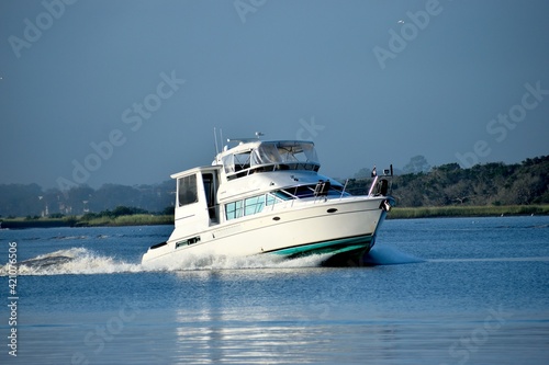 Luxury boat cruising along the river at St. Augustine, Florida.
