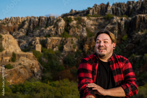 Portrait of a man sitting on the mountain, Cerro del Hierro. Spain.