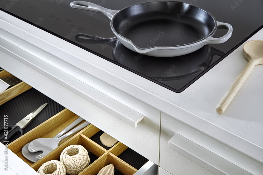 Modern kitchen, Open drawers, Set of cutlery trays in kitchen drawer ...