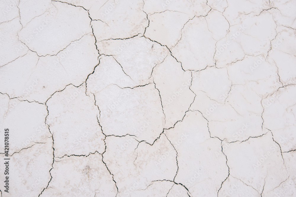 Sandy white cracks on surface texture