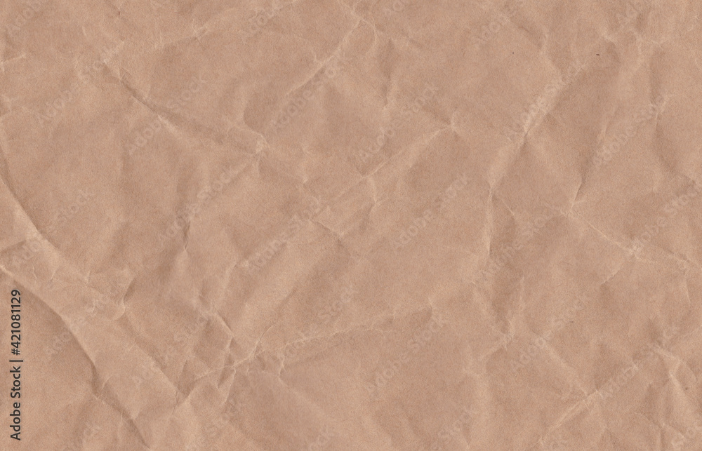 Fototapeta premium Crumpled cream paper background texture. Paper craft