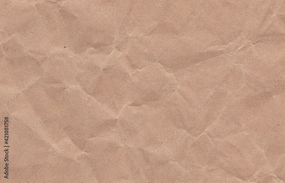 Obraz premium Crumpled cream paper background texture. Paper craft