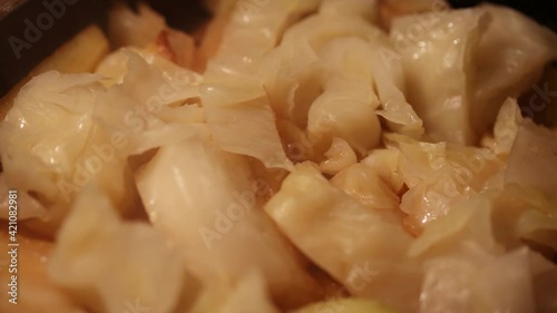 we prepare vegetable dishes from cabbage, potatoes and other ingredients, the chef will mix the products in a saucepan