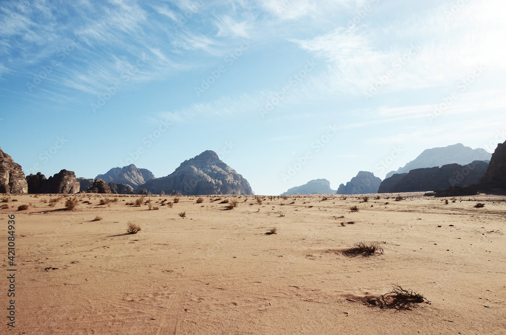 Jordan, Wadi Rum Desert: Scenic landscape view of the desert with mountains in the background 