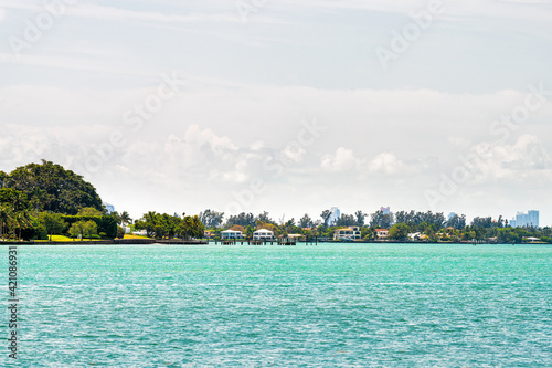 Bal Harbour near Miami, Florida with Biscayne Bay Intracoastal water by Indian Creek island with waterfront oceanfront property houses