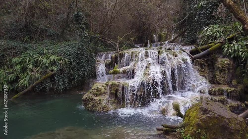 Krushuna waterfalls in northern Bulgaria, Lovech district. Picturesque landscape with many travertines and turquoise blue water