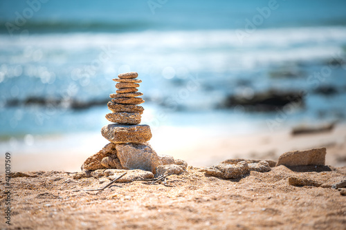 Marineland River to Sea Preserve with shelly limestone cairn rock formation in northern Florida beach by St Augustine with Atlantic ocean waves in blurry blurred background bokeh
