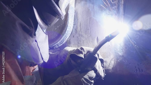 Boilermaker mig welding bright light fast pan in