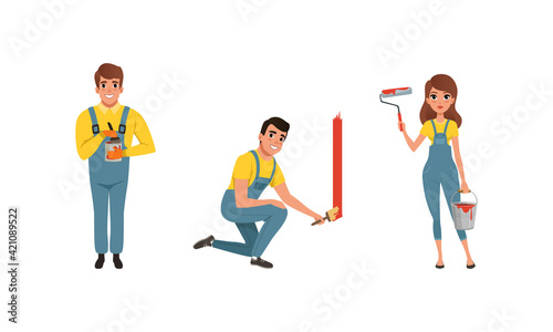 Male and Female House Painter in Overall Standing with Roller and Bucket Vector Set © topvectors
