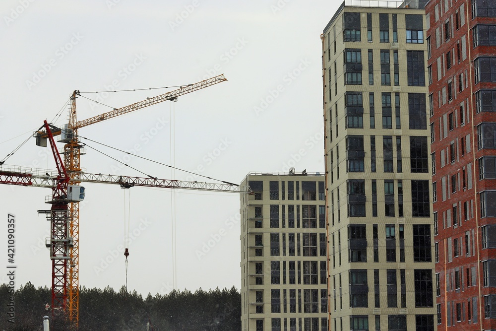Construction cranes, construction of residential multi-storey buildings Construction cranes, construction of residential multi-storey buildings