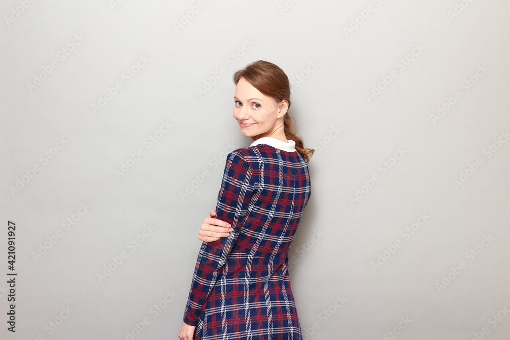 Portrait of happy girl turning around and smiling joyfully Portrait of happy girl turning around and smiling joyfully