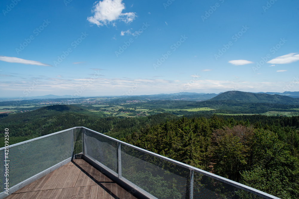 Triangular observation deck with panoramic views of the mountains and summer forest