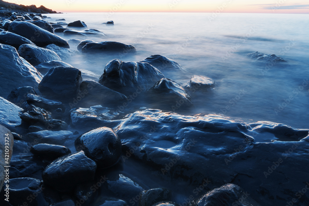 Sea water washing the rocks on the coast. Sea water washing the rocks on the coast.